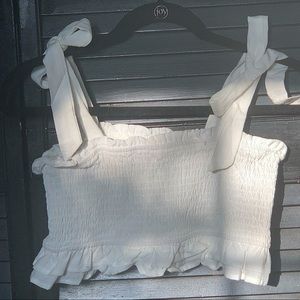 PREPPY White shirred ruffle top, tied shoulders.